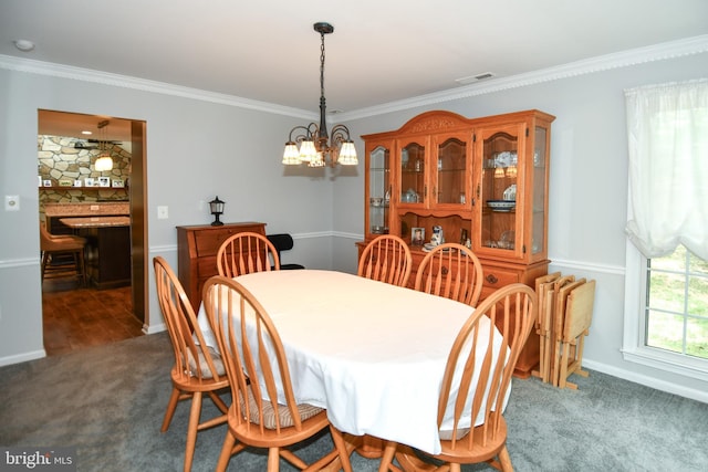 3505 Fox Ridge Rd, Waldorf, MD 20601 - carpeted dining room with a chandelier, ornamental molding, and baseboards