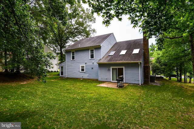 3505 Fox Ridge Rd, Waldorf, MD 20601 - back of property with a lawn, a chimney, and a patio area