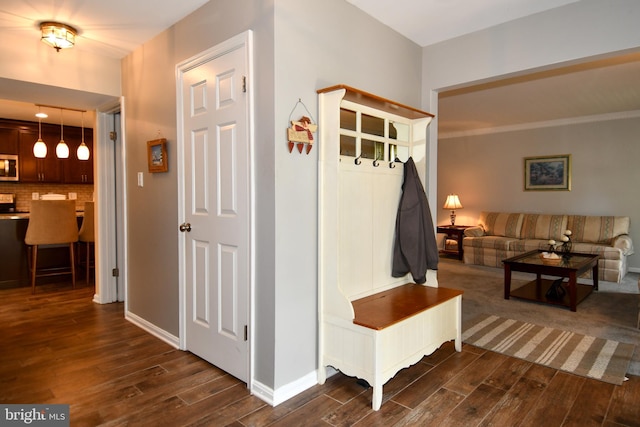 3505 Fox Ridge Rd, Waldorf, MD 20601 - mudroom featuring dark wood-style floors and baseboards