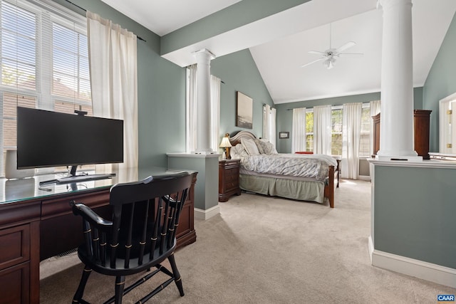 bedroom with ceiling fan, decorative columns, light colored carpet, vaulted ceiling, and baseboards