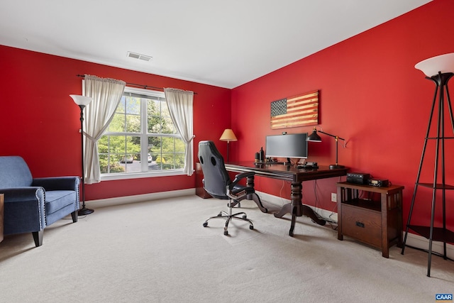 home office with baseboards, carpet flooring, and visible vents