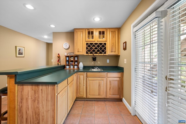 bar featuring plenty of natural light, a sink, wet bar, and recessed lighting