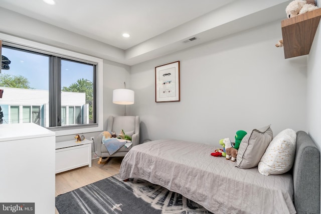 430 15th St SE, Washington, DC 20003 - bedroom with light wood-type flooring, recessed lighting, and visible vents