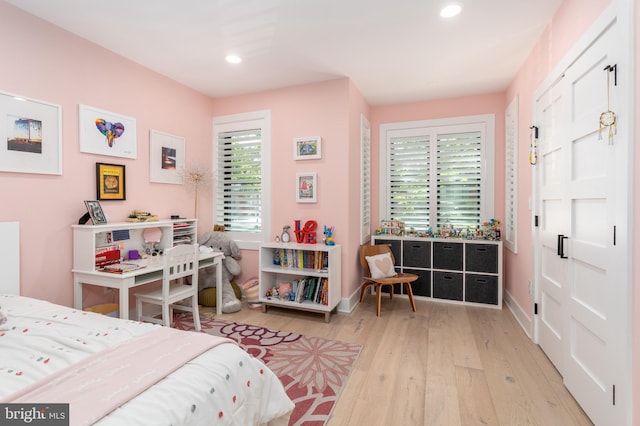 430 15th St SE, Washington, DC 20003 - bedroom with recessed lighting, baseboards, and wood finished floors