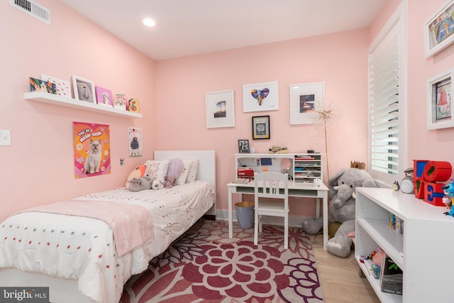 430 15th St SE, Washington, DC 20003 - bedroom with recessed lighting, wood finished floors, and visible vents