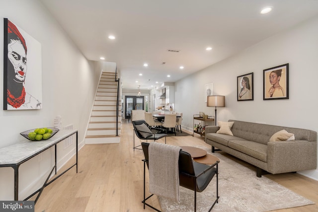 430 15th St SE, Washington, DC 20003 - living room with recessed lighting, light wood finished floors, baseboards, and stairway