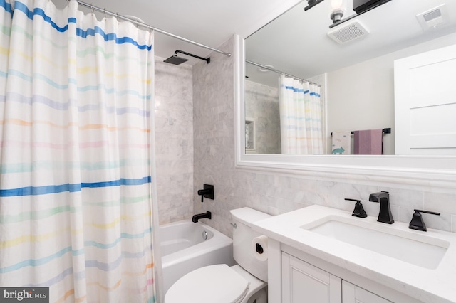 430 15th St SE, Washington, DC 20003 - bathroom featuring visible vents, tile walls, vanity, toilet, and shower / tub combo with curtain