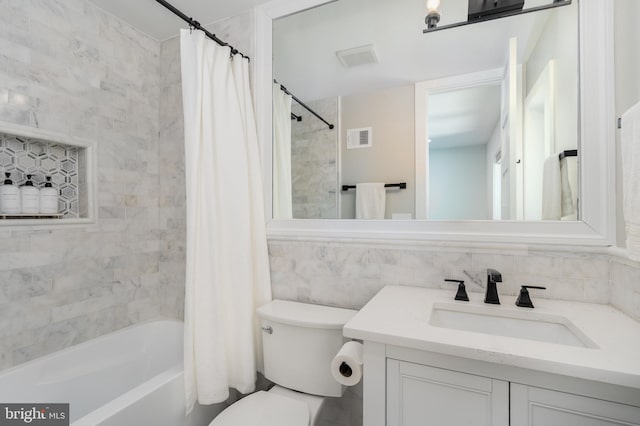 430 15th St SE, Washington, DC 20003 - full bathroom featuring shower / tub combo with curtain, vanity, toilet, tile walls, and visible vents