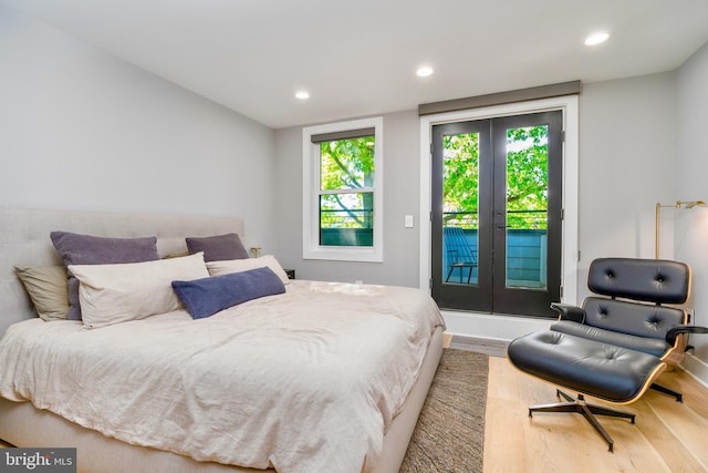 430 15th St SE, Washington, DC 20003 - bedroom featuring access to outside, french doors, recessed lighting, and wood finished floors