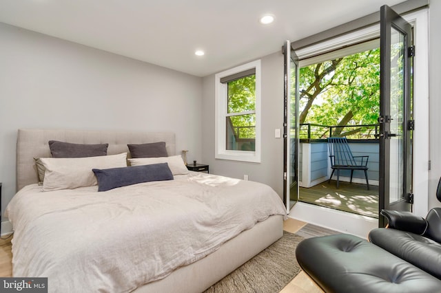 430 15th St SE, Washington, DC 20003 - bedroom featuring recessed lighting, baseboards, wood finished floors, and access to exterior