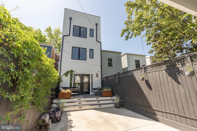 430 15th St SE, Washington, DC 20003 - back of property featuring a patio, fence, and french doors