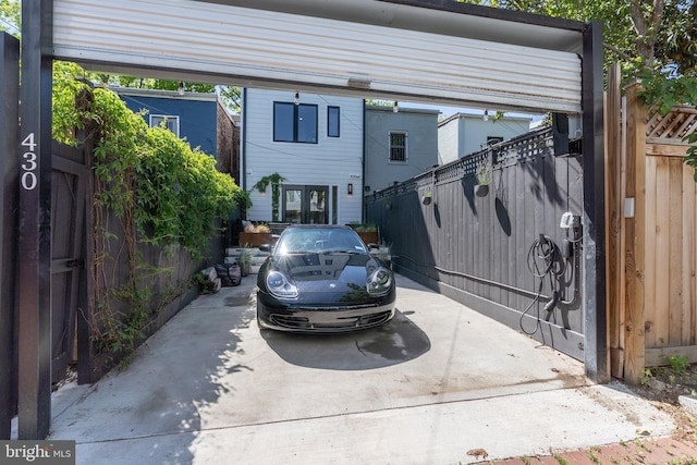 430 15th St SE, Washington, DC 20003 - view of front of house with fence and a carport