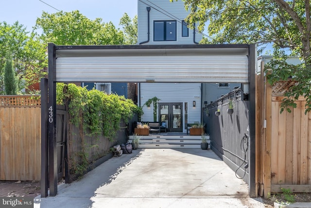 430 15th St SE, Washington, DC 20003 - view of parking / parking lot featuring a gate, fence, and french doors
