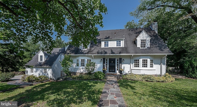 701 Argyle Rd, Wynnewood, PA 19096 - new england style home with a front yard and a chimney