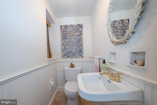 701 Argyle Rd, Wynnewood, PA 19096 - bathroom with wainscoting, toilet, and a sink