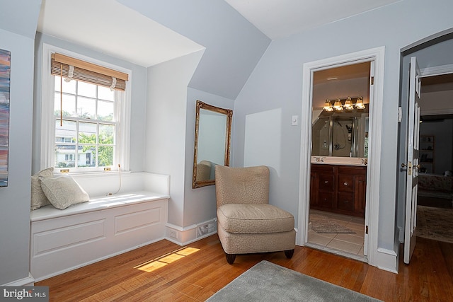 701 Argyle Rd, Wynnewood, PA 19096 - living area featuring wood finished floors and lofted ceiling