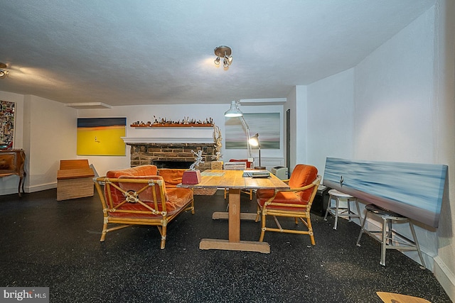 701 Argyle Rd, Wynnewood, PA 19096 - dining area featuring a fireplace and baseboards