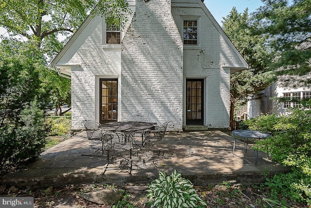 701 Argyle Rd, Wynnewood, PA 19096 - rear view of property featuring a patio area and brick siding