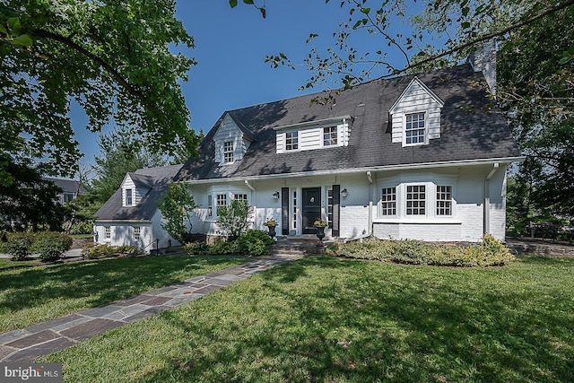701 Argyle Rd, Wynnewood, PA 19096 - cape cod home featuring a front yard and brick siding