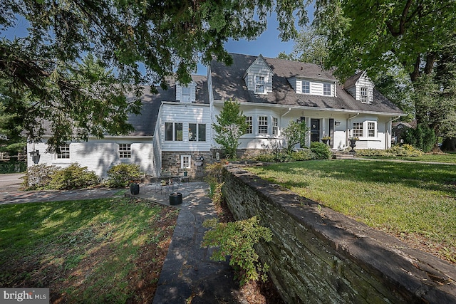 701 Argyle Rd, Wynnewood, PA 19096 - cape cod-style house with a front lawn