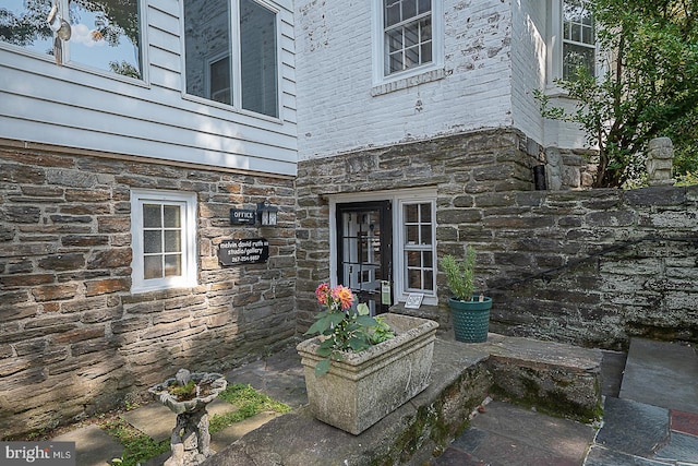 701 Argyle Rd, Wynnewood, PA 19096 - doorway to property with stone siding
