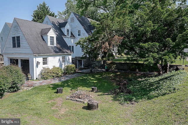 701 Argyle Rd, Wynnewood, PA 19096 - view of side of home with a lawn and brick siding