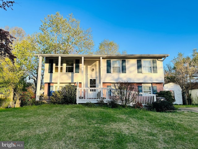 7 Mooncoin Cir, Waldorf, MD 20602 - split foyer home with a front lawn and brick siding