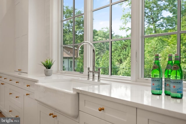 5908 Calla Dr, Mclean, VA 22101 - room details with a sink, white cabinets, and light countertops