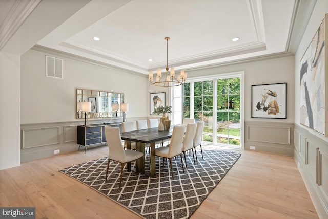 5908 Calla Dr, Mclean, VA 22101 - dining room with visible vents, a raised ceiling, a decorative wall, and a notable chandelier