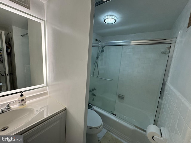 922 24th St NW Unit 517, Washington, DC 20037 - bathroom featuring vanity, toilet, and enclosed tub / shower combo