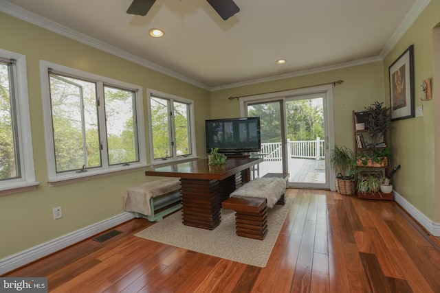 office with baseboards, visible vents, ceiling fan, and hardwood / wood-style floors
