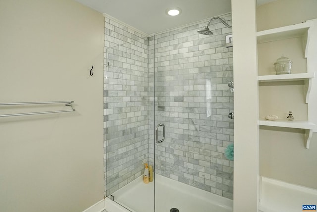 full bath with a shower stall