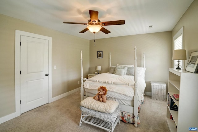 bedroom featuring baseboards, ceiling fan, carpet, and visible vents