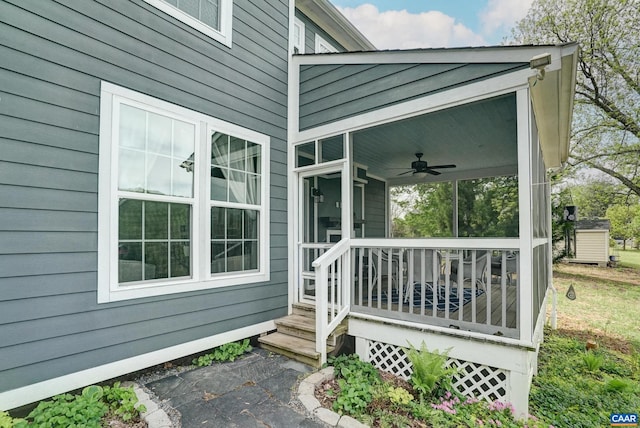 exterior space with a ceiling fan and a porch