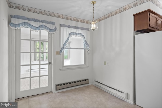 doorway to outside featuring a baseboard heating unit and baseboard heating