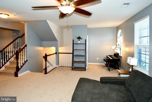1037 Agricopia Dr, La Plata, MD 20646 - living area featuring carpet floors, a ceiling fan, and baseboards