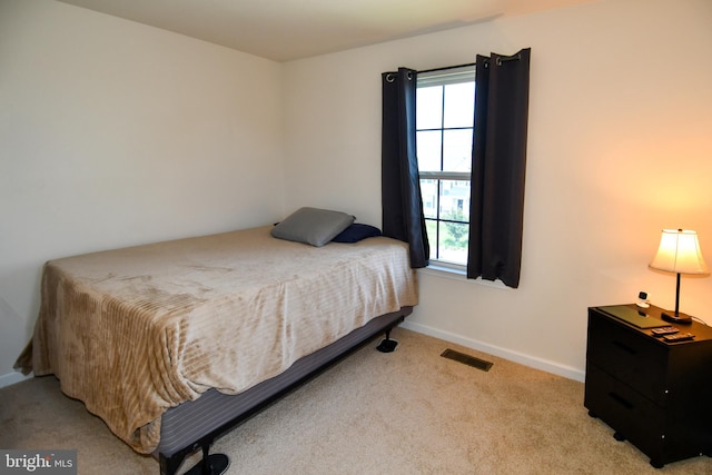 1037 Agricopia Dr, La Plata, MD 20646 - bedroom featuring multiple windows, baseboards, and carpet flooring