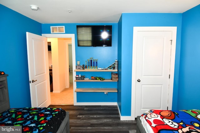 1037 Agricopia Dr, La Plata, MD 20646 - bedroom with dark wood-type flooring and baseboards