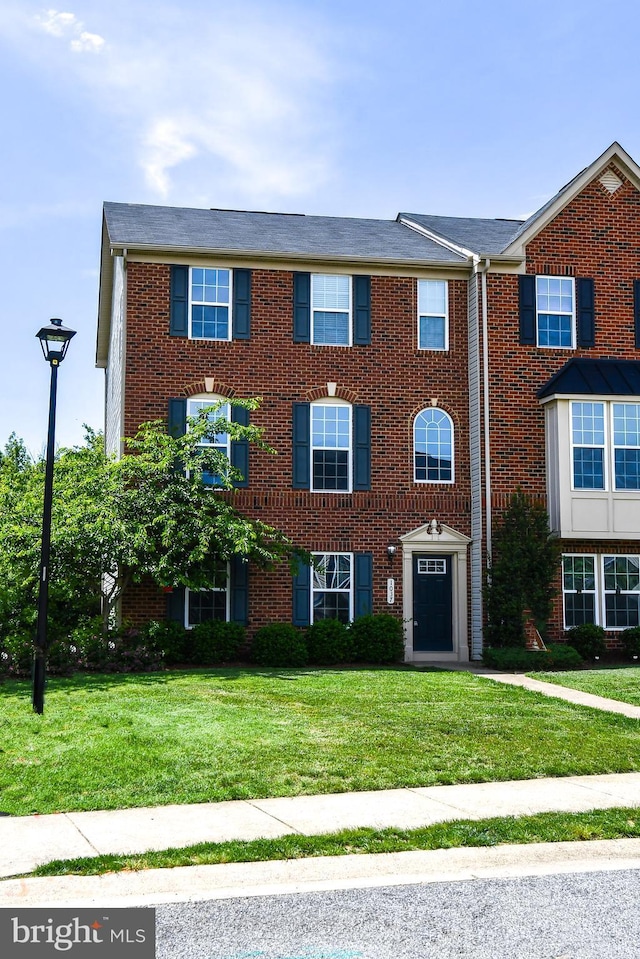 1037 Agricopia Dr, La Plata, MD 20646 - view of front of property with brick siding and a front lawn