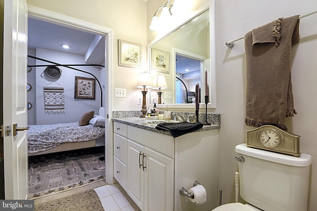 23286 Southdown Manor Ter Unit 108, Ashburn, VA 20148 - full bathroom with toilet, tile patterned floors, and vanity
