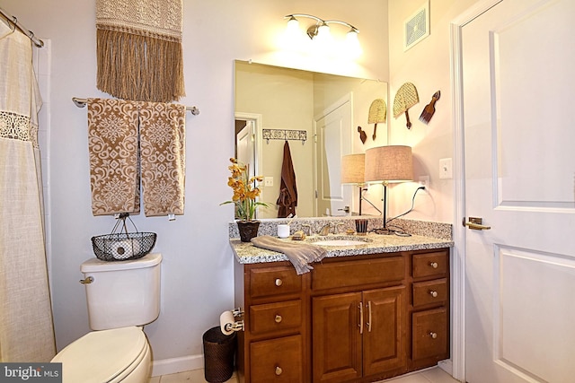 23286 Southdown Manor Ter Unit 108, Ashburn, VA 20148 - bathroom featuring visible vents, vanity, toilet, baseboards, and tile patterned floors