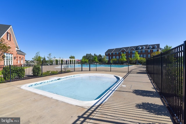 23286 Southdown Manor Ter Unit 108, Ashburn, VA 20148 - community pool with fence
