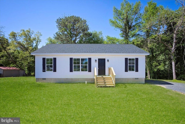4205 Cabin Creek Hurlock Rd, Hurlock, MD 21643 - view of front of property featuring a shingled roof, a front yard, and crawl space
