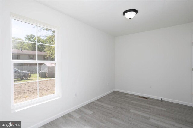 4205 Cabin Creek Hurlock Rd, Hurlock, MD 21643 - empty room with baseboards, wood finished floors, and visible vents