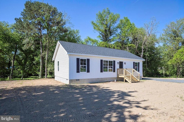 4205 Cabin Creek Hurlock Rd, Hurlock, MD 21643 - manufactured / mobile home featuring a shingled roof and crawl space