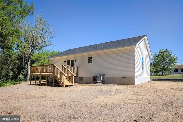 4205 Cabin Creek Hurlock Rd, Hurlock, MD 21643 - back of property with crawl space, a wooden deck, stairway, central AC, and a shingled roof