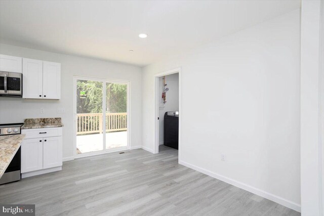 4205 Cabin Creek Hurlock Rd, Hurlock, MD 21643 - unfurnished dining area with light wood-style floors, baseboards, and recessed lighting