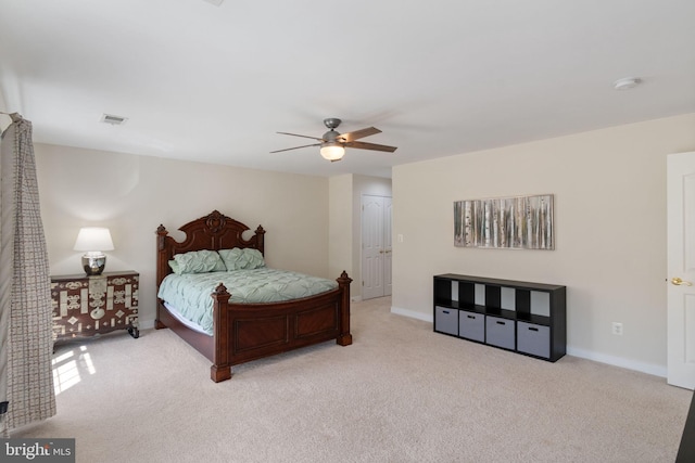 bedroom featuring visible vents, baseboards, and carpet floors