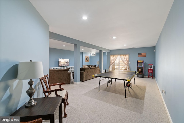 rec room with baseboards, recessed lighting, and light colored carpet