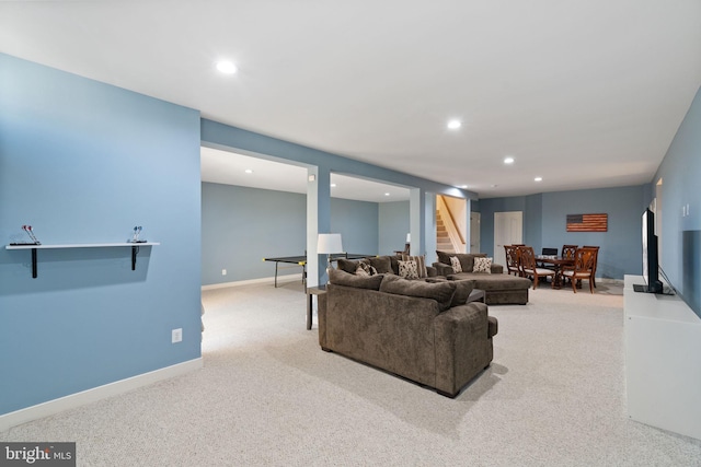 carpeted living room with baseboards and recessed lighting